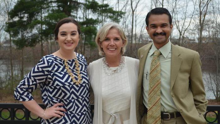 Leaders in the Graduate Student Organization post with President Mary-Beth Cooper